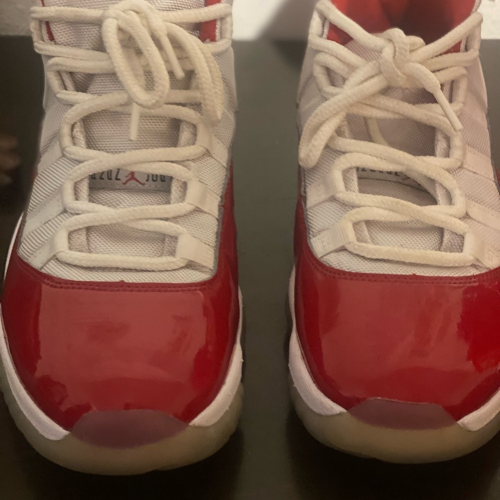 Mens Jordans Red and White Sneakers..good condition;my husband doesn’t wear.
